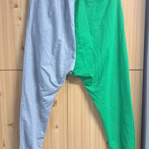 Two-tone sweatpants used, gray and green with metallic buttons, size XL