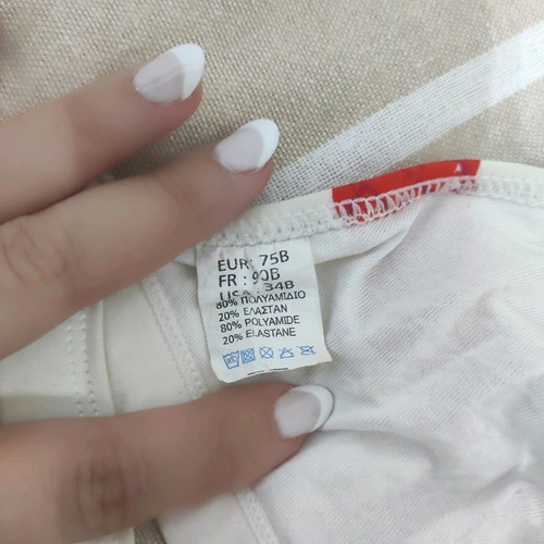 Bikini swimsuit white with orange details and sequins small in very good condition