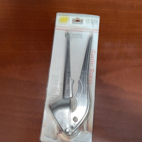 Metal Garlic Press in Packaging