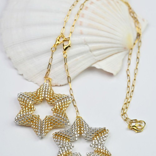 Necklace with two star pendants in white and gold custom made