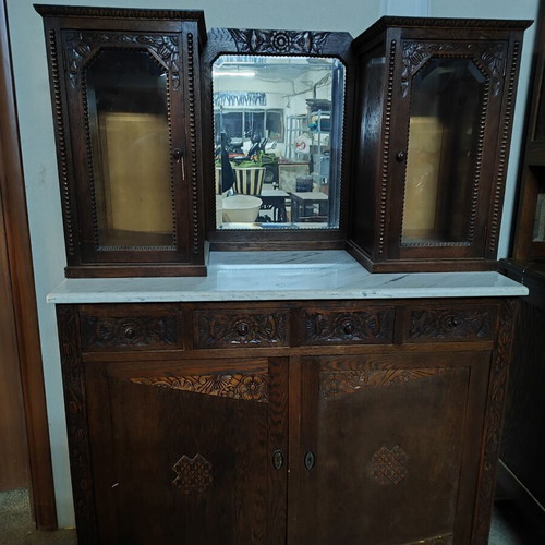 Carved antique buffet used with marble top and mirror