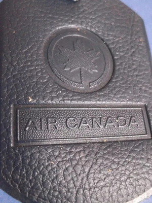 Air Canada vintage luggage tag used, dark blue with strap