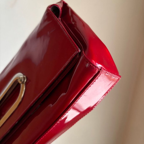 Stuart Weitzman red leather patent clutch bag like new