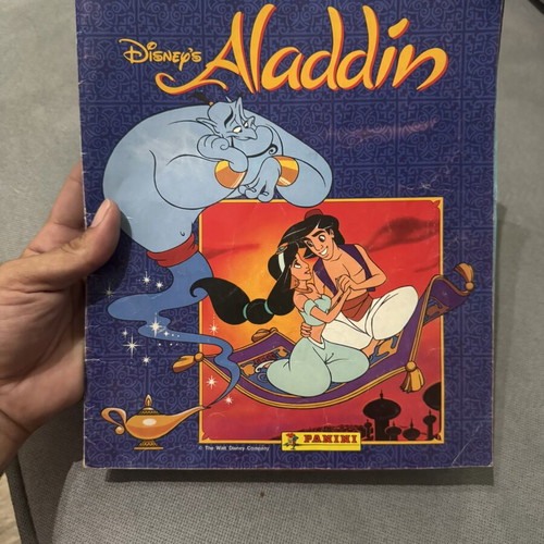 Aladdin Disney Panini sticker album used with 27 missing