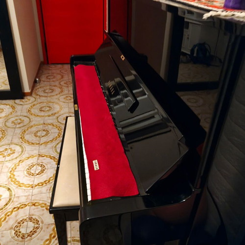 Yamaha piano black slightly used