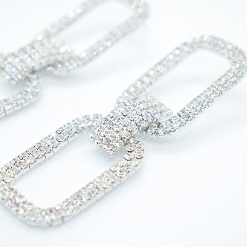 Earrings in silver color with gliter new