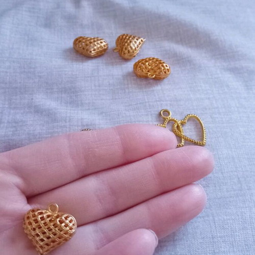 Heart charms used, 6 gold for pendants without chain