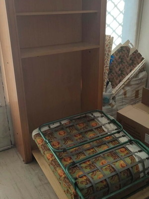 Bookcase with foldable bed used