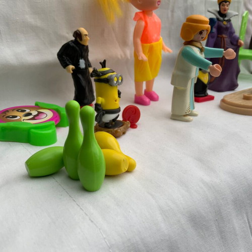 Miniature toys used, old and new figures set