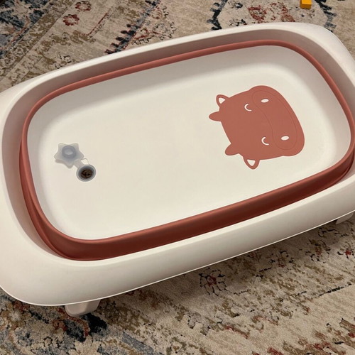 Folding baby bathtub like new