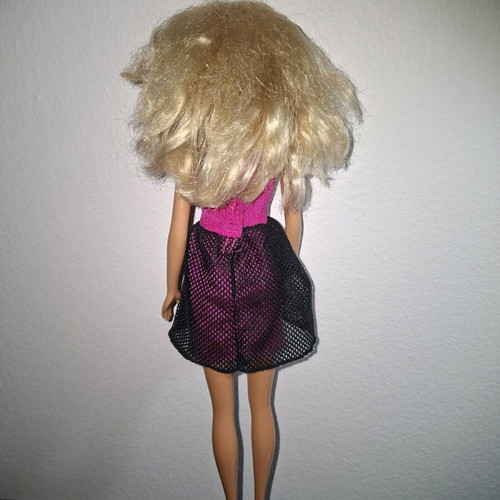 Barbie doll used with original dress and necklace