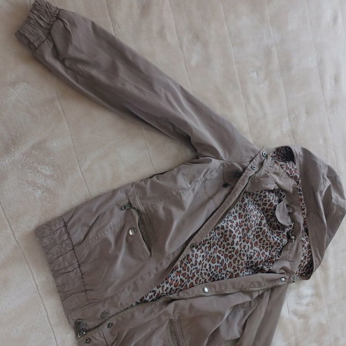 Waterproof jacket used, size M-L, beige with print