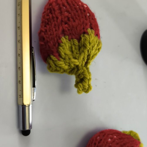 Handmade knitted strawberries with new wool and filling
