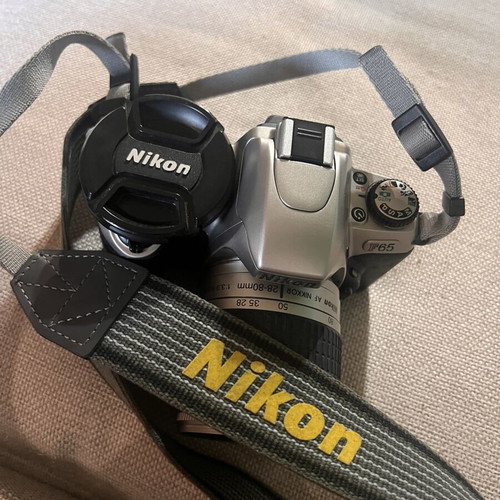 Nikon F65 SLR 35mm camera with AF Nikkor 28-80mm lens and Delsey case
