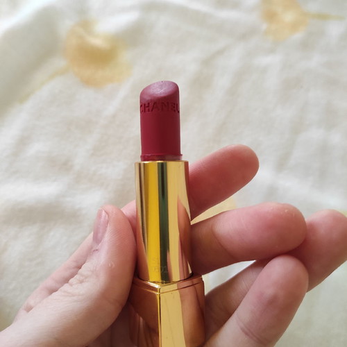 Chanel and Clinique lipsticks used, set of two