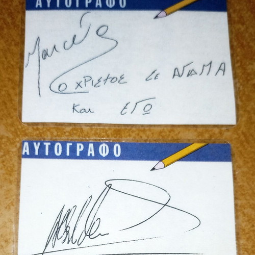 Laminated autographs of old AEK players from Ethnos newspaper