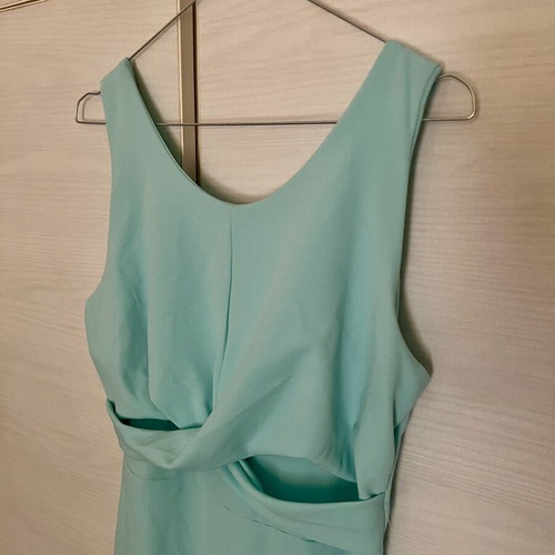 Dress new in turquoise color, size M