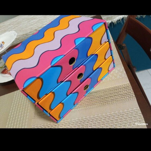 Storage box like new with three drawers, paper