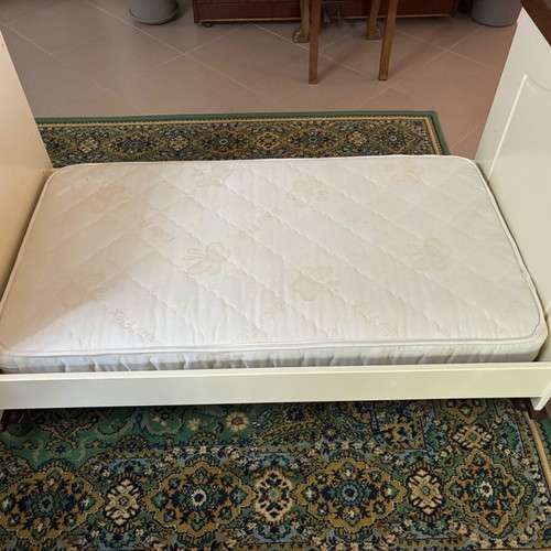 Preteen bed with mattress and changing drawer like new, bassinet included