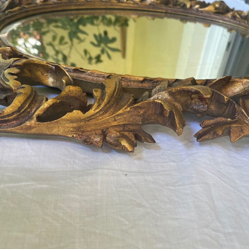Antique mirror used with hand-carved frame over 100 years old