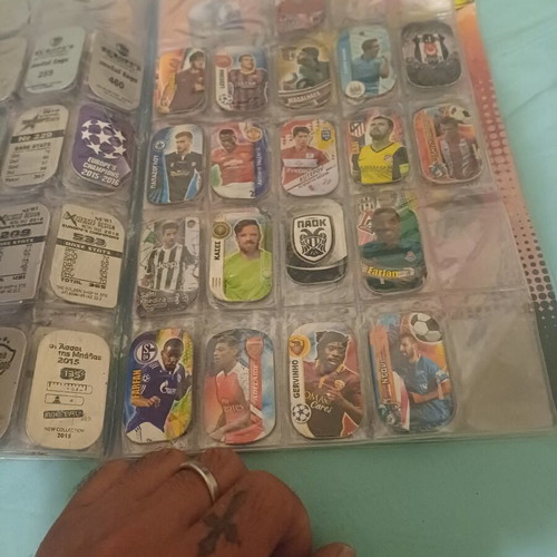 Panini metal tags album like new, contains about 80 metallics