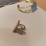 Handmade adjustable statement ring with white resin and gold base