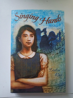 Singing Hands novel in English like new