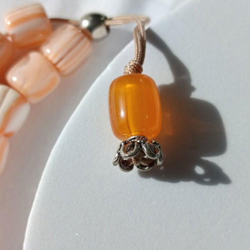 Komboloi with peach-orange cubic beads like new
