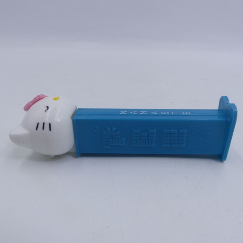 Hello Kitty Pez Dispenser used, Yoga Pez Namaste pink flower