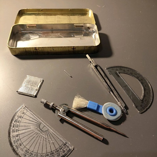 Vintage set of geometric instruments used