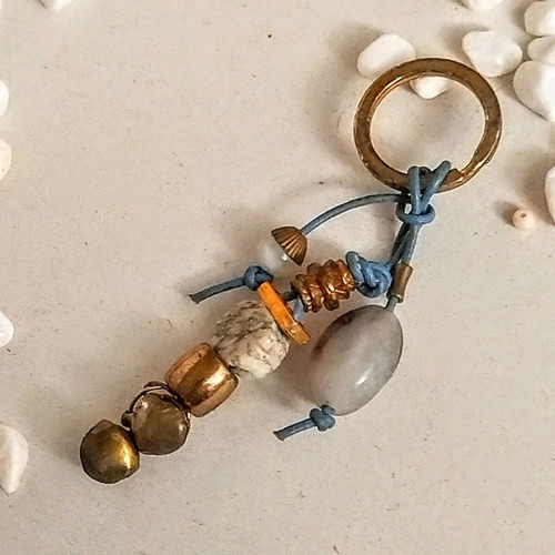 Handmade keychain new from natural materials with blue leather cord