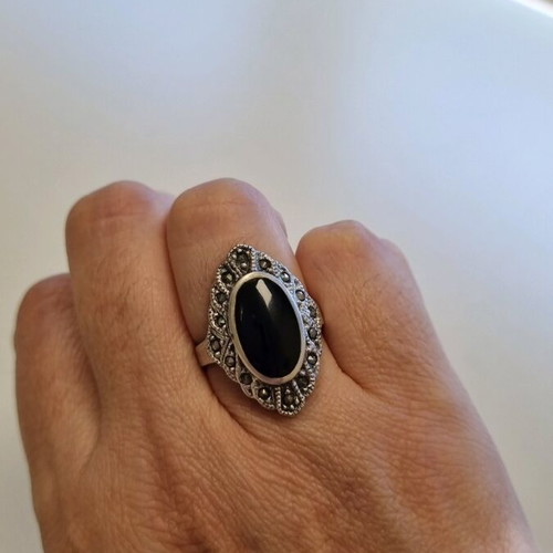 Silver ring with black stone like new, size 57