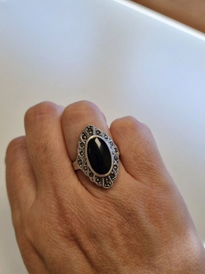 Silver ring with black stone like new, size 57
