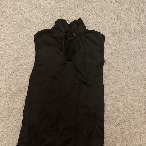 Black satin blouse with 3-D rose design like new