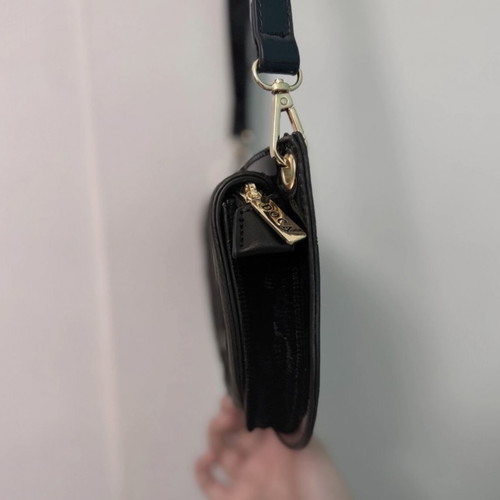 Doca crossbody bag like new, black with gold details