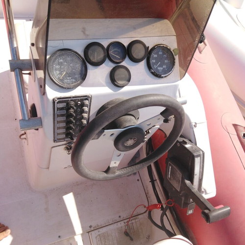 Olympic 5.25 inflatable boat with 115 Mercury engine