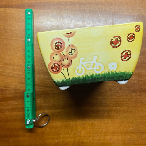 Clay container used with painted design