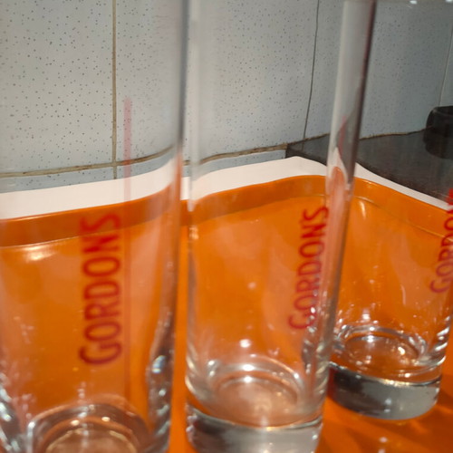 Gordon's three collectible souvenir glasses like new