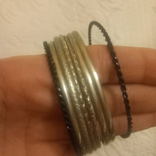 Bracelets used, set of 8, silver and black