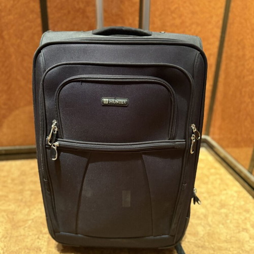 Hunter black trolley suitcase used with telescopic handle