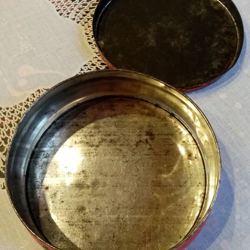 Vintage tin box used with floral and dog motifs