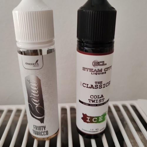 Steam City Flavour Shot Cola Twist and Omerta Carat fruity tobacco e-liquids like new