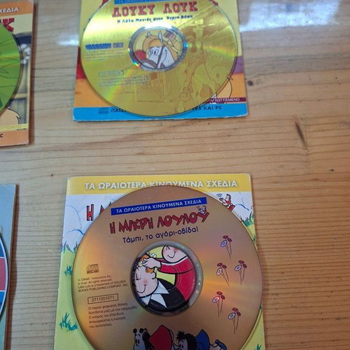 Collection of 10 children's animated DVDs with cases, dubbed