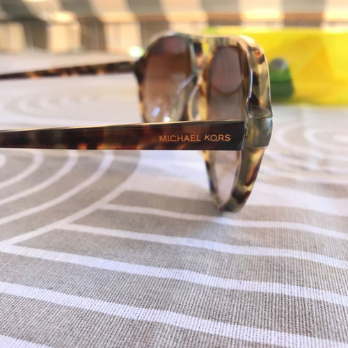 Michael Kors sunglasses used tortoise brown with gradient lenses