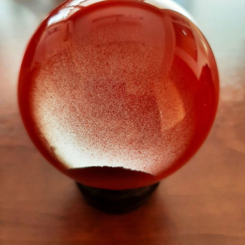 Indian crystal sphere red color on wooden base new