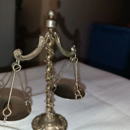 Vintage metal scale and decorative peacocks used