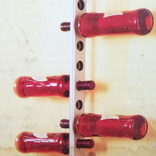 Wall-mounted metal wine rack 12 bottles, unused with slight marks