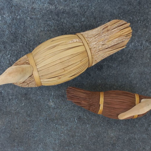 Set of handmade decorative wicker ducks used