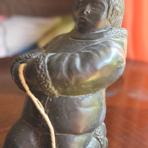 Three Inuit figurines used, indigenous Eskimo creations from Canada
