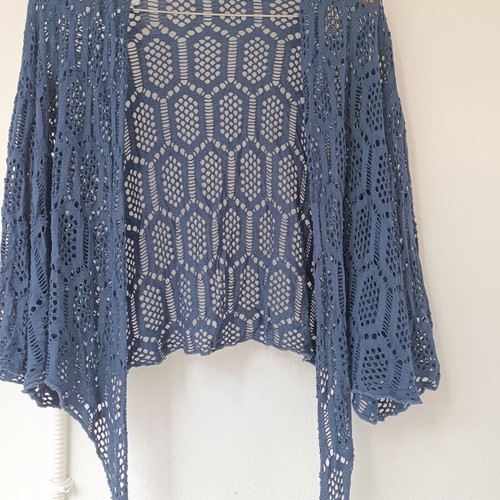 Blue summer bolero used with natural signs of wear